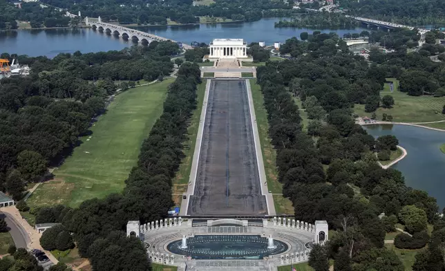 The Lincoln Memorial and the Reflecting Pool are seen from the Washington Monument, Wednesday, July 15, 2026, in Washington. (AP Photo/Rahmat Gul)