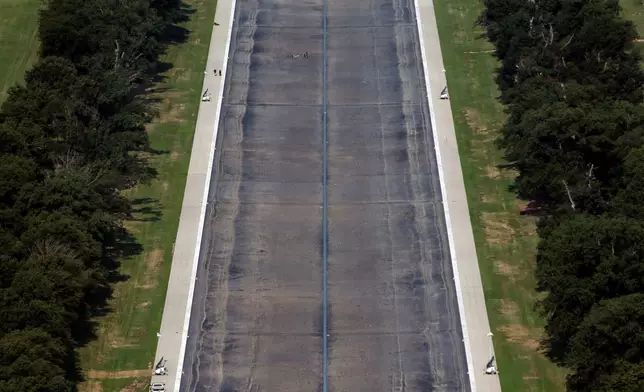 The Reflecting Pool is seen from the Washington Monument, Wednesday, July 15, 2026. in Washington. (AP Photo/Rahmat Gul)