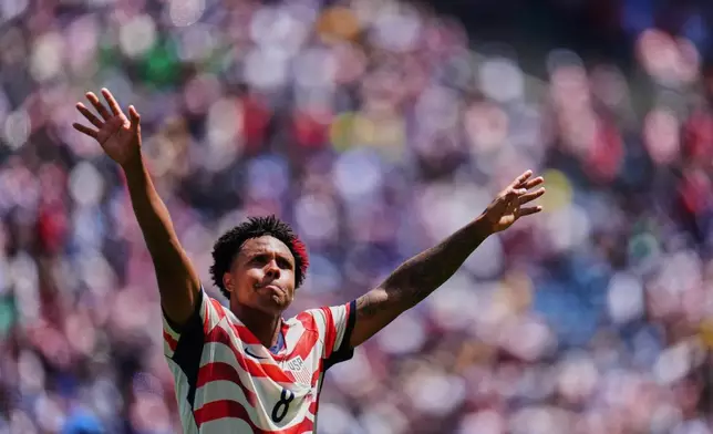 United States' Weston McKennie (8) celebrates after winning the World Cup Group D soccer match against Australia in Seattle, Friday, June 19, 2026. (AP Photo/Manu Fernandez)