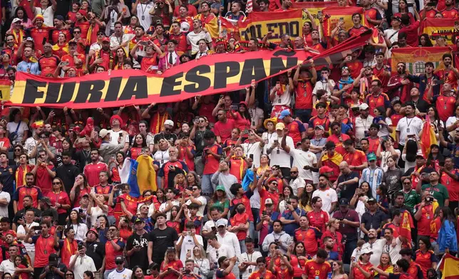 Fans stand during the national anthem of Spain before the World Cup round of 32 soccer match between Spain and Austria in Inglewood, Calif., near Los Angeles, Thursday, July 2, 2026. (AP Photo/Jae C. Hong)