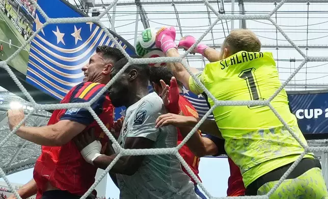 Switzerland goalkeeper Gregor Kobel (1) is fouled on a corner kick during the World Cup round of 32 soccer match between Spain and Austria in Inglewood, Calif., near Los Angeles, Thursday, July 2, 2026. (AP Photo/Andre Penner)(AP Photo/Andre Penner)