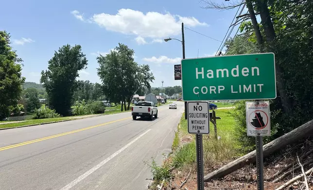 A sign marks the city's limits Wednesday, July 1, 2026 in Hamden, Ohio. (AP Photo/Julie Carr Smyth)