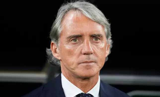 FILE - Saudi Arabia's head coach Roberto Mancini stands for the national anthems ahead of the Asian Cup Group F soccer match between Saudi Arabia and Thailand at Education City Stadium, in Al Rayyan, Qatar, Thursday, Jan. 25, 2024. (AP Photo/Aijaz Rahi, file)