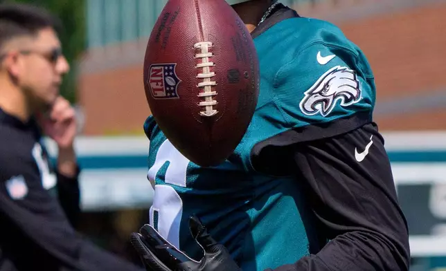 Philadelphia Eagles wide receiver DeVonta Smith (6) runs a drill during practice at the team's NFL football training camp in Philadelphia, Wednesday, July 29, 2026. (AP Photo/Chris Szagola)