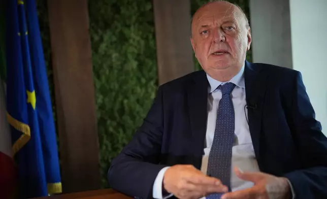 Minister of Environment and Energy Security Gilberto Pichetto Fratin talks during an interview with the Associated Press, in Rome, Wednesday, July 22, 2026. (AP Photo/Andrew Medichini)
