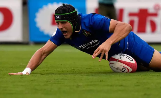 Italy's Juan Ignacio Brex scores a try during a Nations Championship rugby match between Japan and Italy in Tokyo, Saturday, July 4, 2026. (AP Photo/Shuji Kajiyama)
