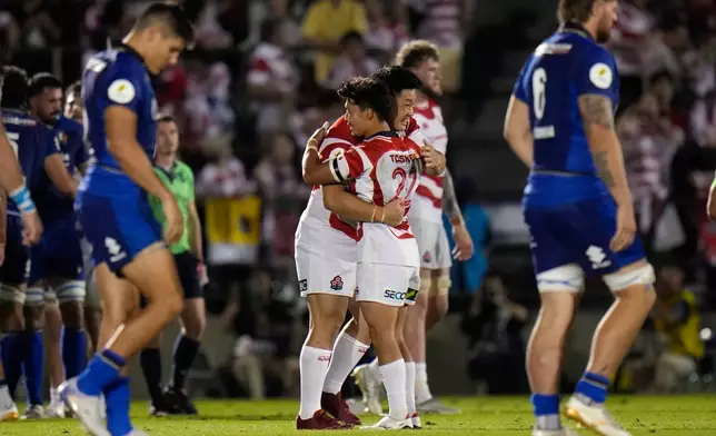 Japan's team players celebrate after their win over Italy during the Nations Championship rugby match between Japan and Italy in Tokyo, Saturday, July 4, 2026. (AP Photo/Shuji Kajiyama)
