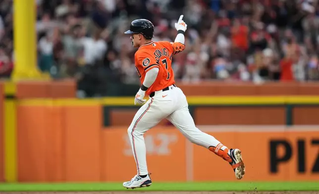 Detroit Tigers' Kevin McGonigle reacts to his two-run home rune against the Philadelphia Phillies during the third inning Friday, July 10, 2026, in Detroit. (AP Photo/Paul Sancya)