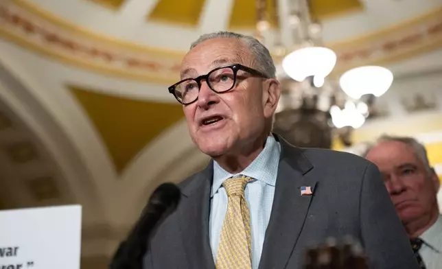 Senate Minority Leader Chuck Schumer, D-N.Y., speaks to reporters following a weekly policy luncheon at the Capitol in Washington, Tuesday, July 21, 2026. (AP Photo/Allison Robbert)