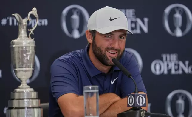 FILE - Scottie Scheffler of the United States speaks at a news conference after winning the British Open golf championship at the Royal Portrush Golf Club, Northern Ireland, July 20, 2025. (AP Photo/Jon Super, File)