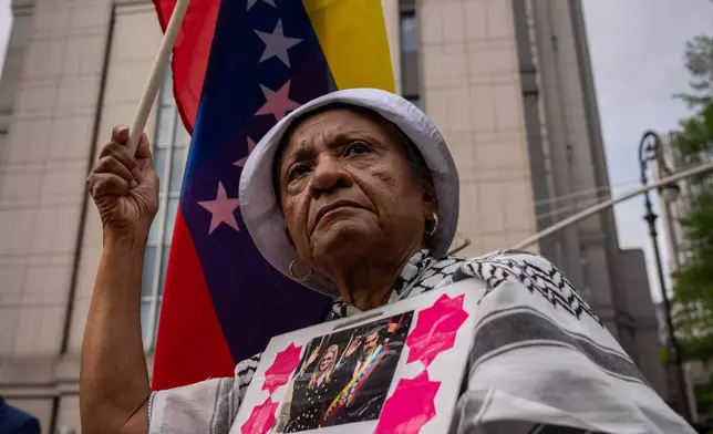 People protest in support of former Venezuela President Nicolas Maduro and his wife Cilia Flores outside of Manhattan federal court, Wednesday, July 22, 2026, in New York.(AP Photo/Adam Gray)