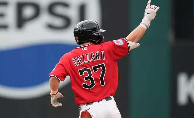 Cleveland Guardians' Travis Bazzana (37) gestures as he runs the bases with a home run in the second inning of a baseball game against the Minnesota Twins in Cleveland, Monday, July 20, 2026. (AP Photo/Sue Ogrocki)
