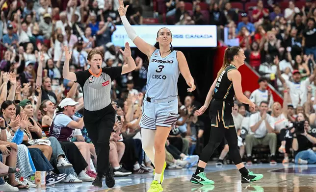 Toronto Tempo's Marina Mabrey (3) reacts after scoring a three-point shot during the second half of a WNBA basketball game against the New York Liberty in Montreal, on Sunday, July 12, 2026. (Graham Hughes/The Canadian Press via AP)