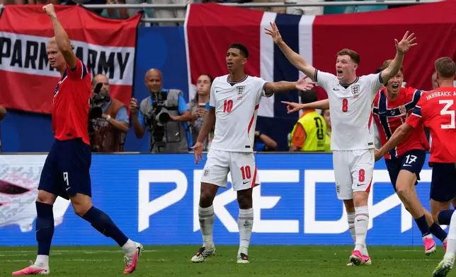Norway's Erling Haaland (9), England's Jude Bellingham (10) and England's Elliot Anderson (8) react after Norway's Torbjoern Heggem (17) scored a goal that was disallowed during the World Cup quarterfinal soccer match between Norway and England in Miami Gardens, Fla., Saturday, July 11, 2026. (AP Photo/Chris Carlson)