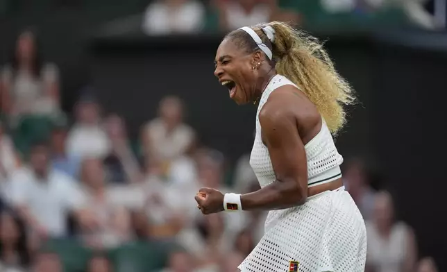 Serena Williams of the United States celebrates winning a point against Maya Joint of Australia in their first round women's singles match at the Wimbledon Tennis Championships in London, Tuesday, June 30, 2026. (AP Photo/Maja Smiejkowska)