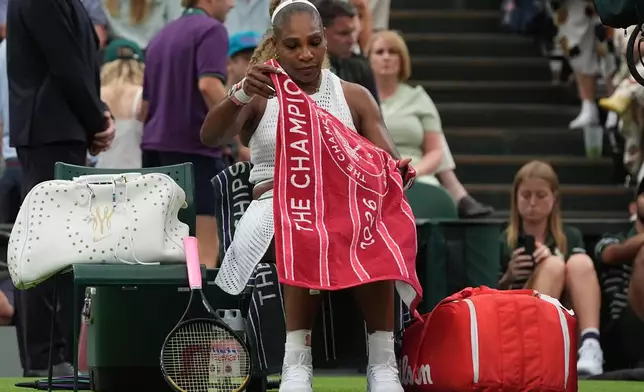 Serena Williams of the United States sits during a changeover in her first round women's singles match against Maya Joint of Australia, at the Wimbledon Tennis Championships in London, Tuesday, June 30, 2026. (AP Photo/Maja Smiejkowska)