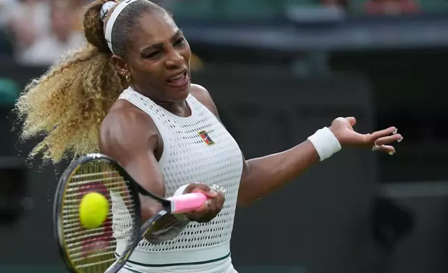 Serena Williams of the United States plays a forehand against Maya Joint of Australia in their first round women's singles match at the Wimbledon Tennis Championships in London, Tuesday, June 30, 2026. (AP Photo/Maja Smiejkowska)