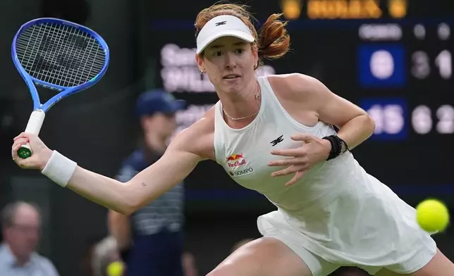 Maya Joint of Australia returns the ball to Serena Williams of the United States in their first round women's singles match at the Wimbledon Tennis Championships in London, Tuesday, June 30, 2026. (AP Photo/Maja Smiejkowska)