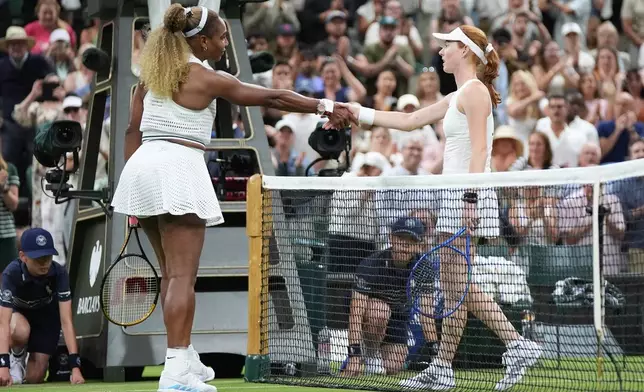 Serena Williams of the United States, left, and Maya Joint of Australia shake hands at the end of their first round women's singles match at the Wimbledon Tennis Championships in London, Tuesday, June 30, 2026. (AP Photo/Maja Smiejkowska)