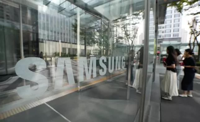 The logo of the Samsung Electronics Co. is seen at its office in Seoul, South Korea, Thursday, July 30, 2026. (AP Photo/Ahn Young-joon)
