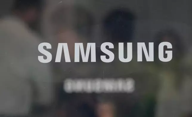 The logo of the Samsung Electronics Co. is seen at its office in Seoul, South Korea, Thursday, July 30, 2026. (AP Photo/Ahn Young-joon)