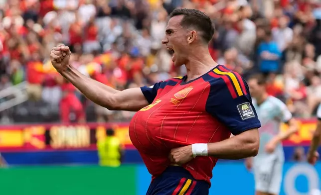 Spain's Fabian Ruiz (8) reacts after scoring the opening goal of his team during the World Cup quarterfinal soccer match between Spain and Belgium in Inglewood, Calif., near Los Angeles, Friday, July 10, 2026. (AP Photo/Andre Penner)