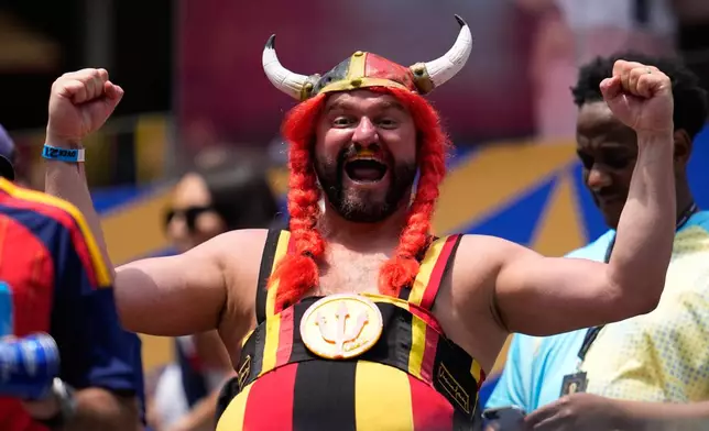 A Belgium supporter cheers before the World Cup quarterfinal soccer match between Spain and Belgium in Inglewood, Calif., near Los Angeles, Friday, July 10, 2026. (AP Photo/Gregory Bull)