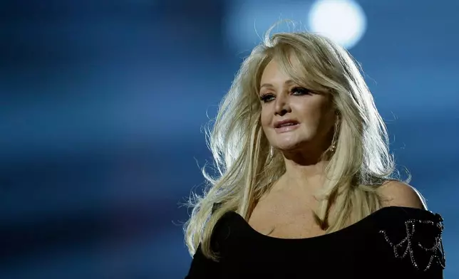 FILE - Singer Bonnie Tyler performs her song "Believe in Me" during a rehearsal for the final of the Eurovision Song Contest at the Malmo Arena in Malmo, Sweden on May 17, 2013. (AP Photo/Alastair Grant, File)