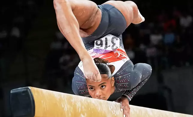 Alia Leat of England competes in the Women's Balance Beam final of Artistic Gymnastics at the Commonwealth Games in Glasgow, Scotland, Tuesday, July 28, 2026. (AP Photo/Manish Swarup)