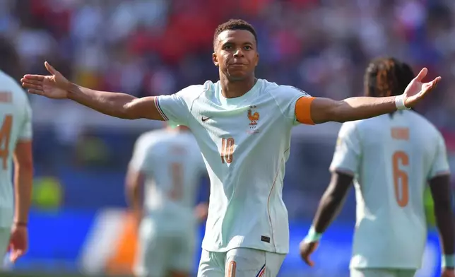 France's Kylian Mbappe (10) celebrates scoring the opening goal during the World Cup quarterfinal soccer match between France and Morocco in Foxborough, Mass., near Boston, Thursday, July 9, 2026. (AP Photo/Steven Senne)