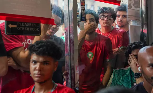 Morocco fans react after an opposing goal while watching the Quarterfinal stage, Morocco vs. France World Cup match, on Thursday, July 9, 2026, in Queens, New York. (AP Photo/Ryan Murphy)