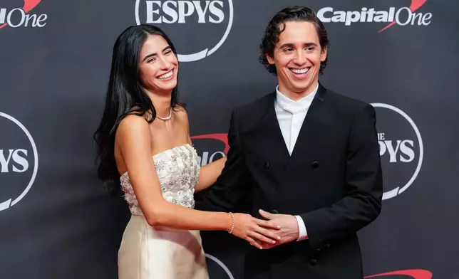 Ana Amelia Batlle Cabral, left, and Marcello Hernández arrive at the ESPY Awards at Lincoln Center on Wednesday, July 15, 2026, in New York. (AP Photo/Yuki Iwamura)