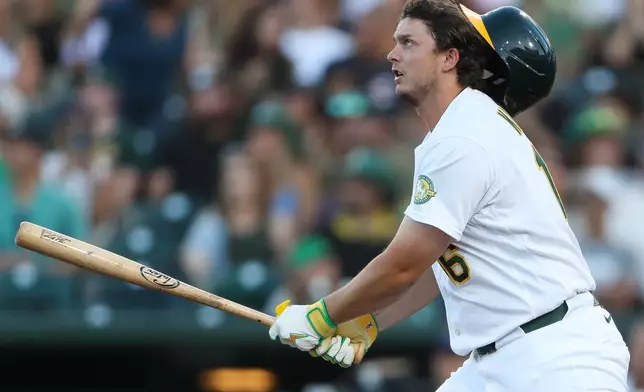 Athletics' Nick Kurtz watches his two-run home run during the third inning of a baseball game against the Miami Marlins Friday, July 3, 2026, in West Sacramento, Calif. (AP Photo/Scott Marshall)