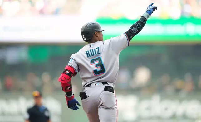 Miami Marlins' Esteury Ruiz reacts after hitting a home run during the third inning of a baseball game against the Milwaukee Brewers Sunday, July 19, 2026, in Milwaukee. (AP Photo/Kayla Wolf)