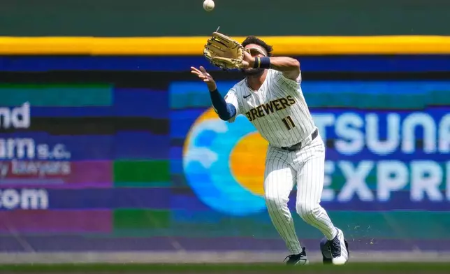 Milwaukee Brewers left fielder Jackson Chourio catches a fly ball hit by Miami Marlins' Liam Hicks during the second inning of a baseball game Sunday, July 19, 2026, in Milwaukee. (AP Photo/Kayla Wolf)