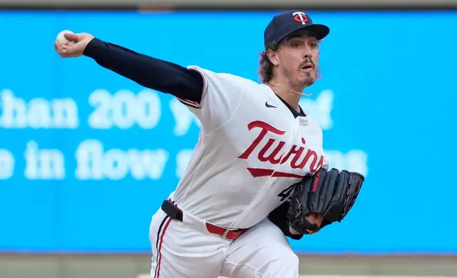 Minnesota Twins starting pitcher Joe Ryan throws to the Kansas City Royals in the first inning of a baseball game Wednesday, July 29, 2026, in Minneapolis. (AP Photo/Bruce Kluckhohn)