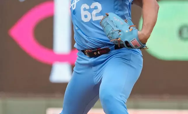 Kansas City Royals starting pitcher Randy Dobnak throws to the Minnesota Twins in the first inning of a baseball game Wednesday, July 29, 2026, in Minneapolis. (AP Photo/Bruce Kluckhohn)