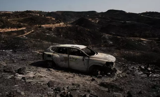 A view of a burnt area affected by wildfires in Bedar, near Almeria, Spain, Saturday, July 11, 2026. (AP Photo/Gregorio Marrero)