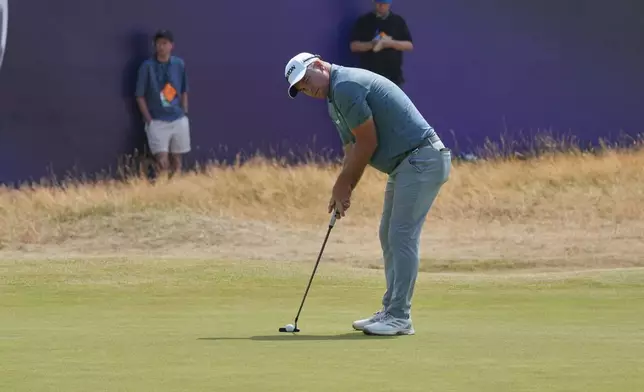 Ryan Fox of New Zealand putts on the 18th green during the third day of the British Open Golf championships at Royal Birkdale golf club, in Southport, England, Saturday, July 18, 2026. (AP Photo/Jon Super)