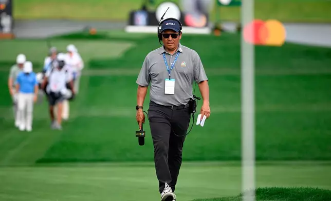 FILE - NBC golf analyst Notah Begay walks on the 14th green during the second round of the Arnold Palmer Invitational golf tournament, March 8, 2024, in Orlando, Fla. (AP Photo/Phelan M. Ebenhack, File)