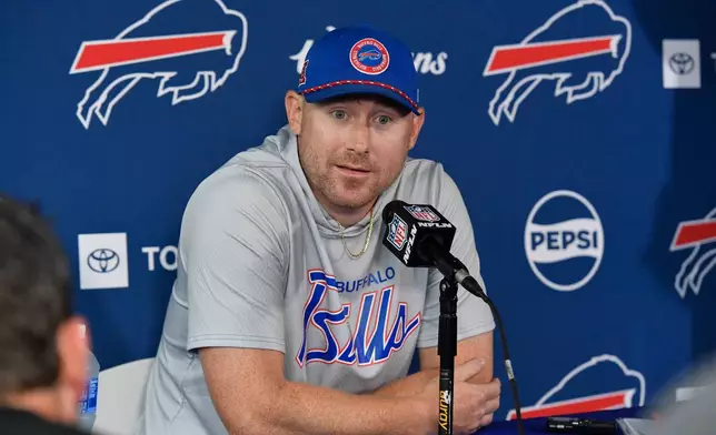 Buffalo Bills head coach Joe Brady speaks to the media before practice at the team's NFL football training camp Wednesday, July 29, 2026, in Pittsford, N.Y. (AP Photo/Adrian Kraus)