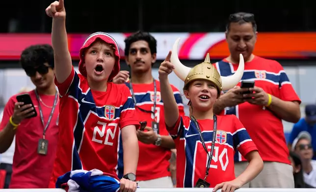 Norway fans on the stands wait for the start of the World Cup quarterfinal soccer match between Norway and England in Miami Gardens, Fla., Saturday, July 11, 2026. (AP Photo/Rebecca Blackwell)