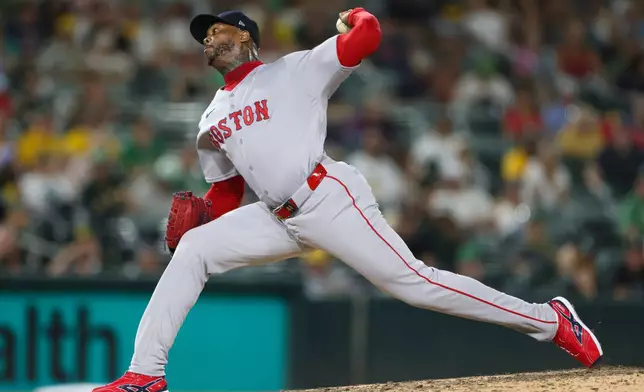 Boston Red Sox's pitcher Aroldis Chapman throws to an Athletics batter during the ninth inning of a baseball game Wednesday, July 29, 2026, in West Sacramento, Calif. (AP Photo/Scott Marshall)
