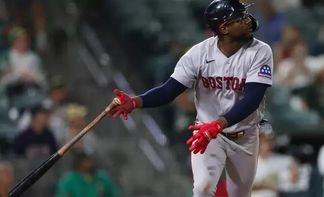 Boston Red Sox's Andruw Monasterio watches his two-run home run during the 10th inning of a baseball game against the Athletics Wednesday, July 29, 2026, in West Sacramento, Calif. (AP Photo/Scott Marshall)