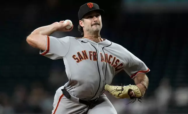 San Francisco Giants starting pitcher Trevor McDonald throws against the Arizona Diamondbacks during the first inning of a baseball game, Wednesday, July 1, 2026, in Phoenix. (AP Photo/Ross D. Franklin)
