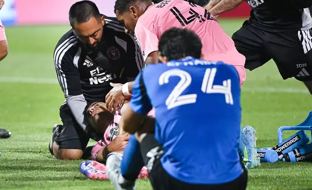 Inter Miami CF's German Berterame is tended to by medical staff after colliding with CF Montreal's Efrain Morales (24) during second half MLS soccer action in Montreal, on Saturday, July 25, 2026. Berterame was taking off the pitch via ambulance. (Graham Hughes/The Canadian Press via AP)