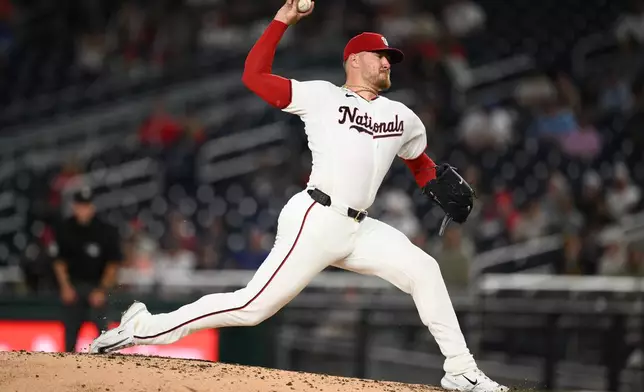 Washington Nationals pitcher Cade Cavalli throws during the third inning of a baseball game against the Toronto Blue Jays, Tuesday, July 28, 2026, in Washington. (AP Photo/Nick Wass)