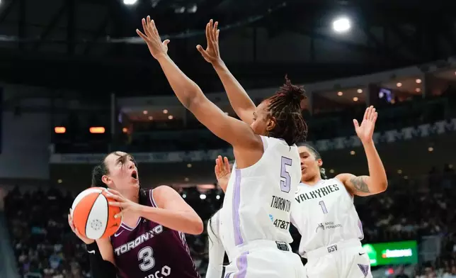 Toronto Tempo guard Marina Mabrey (3) shoots against Golden State Valkyries forward Kayla Thornton (5) during the first half of a WNBA basketball game in Toronto on Wednesday, July 8, 2026. (Chris Young/The Canadian Press via AP)