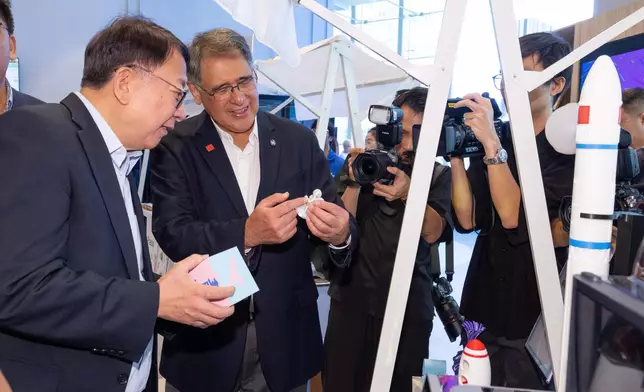 Chan Kwok-ki, Chief Secretary for Administration of the HKSAR Government (left) and Club Deputy Chairman Lester Huang (right) tour booths at the opening ceremony of youthfest@HK 2026.