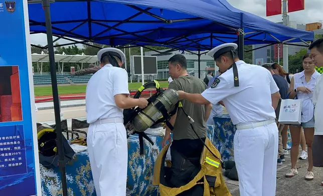 Visitors queued up to take part in the various military experiences on offer at the activity zones. Photo by Bastille Post